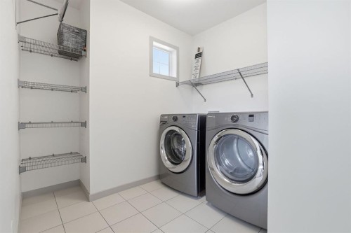 341 Marquis Heights Se, Calgary, AB - Indoor Photo Showing Laundry Room