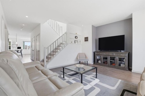 341 Marquis Heights Se, Calgary, AB - Indoor Photo Showing Living Room