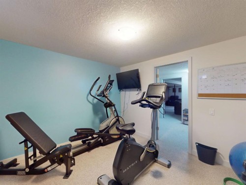 5839 Dalkeith Hill Nw, Calgary, AB - Indoor Photo Showing Gym Room