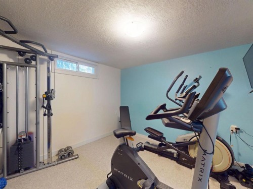 5839 Dalkeith Hill Nw, Calgary, AB - Indoor Photo Showing Gym Room