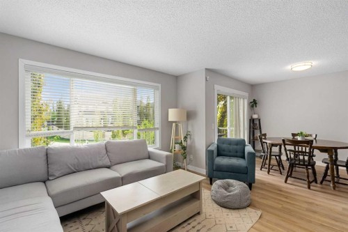 105 Sunset Common, Cochrane, AB - Indoor Photo Showing Living Room
