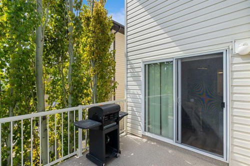 105 Sunset Common, Cochrane, AB - Outdoor With Deck Patio Veranda With Exterior