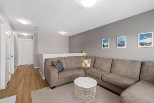 105 Sunset Common, Cochrane, AB - Indoor Photo Showing Living Room