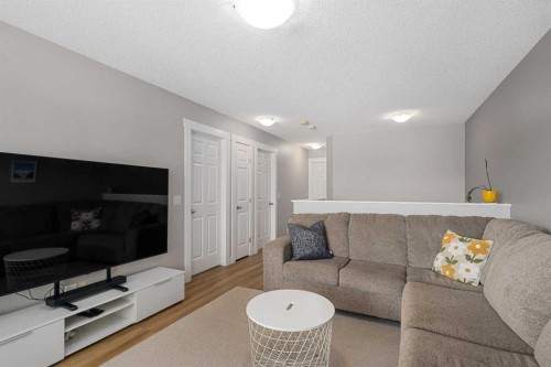 105 Sunset Common, Cochrane, AB - Indoor Photo Showing Living Room