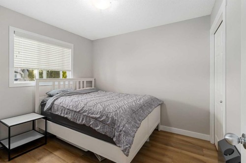 105 Sunset Common, Cochrane, AB - Indoor Photo Showing Bedroom