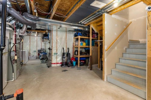 105 Sunset Common, Cochrane, AB - Indoor Photo Showing Basement