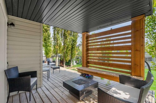 105 Sunset Common, Cochrane, AB - Outdoor With Deck Patio Veranda With Exterior