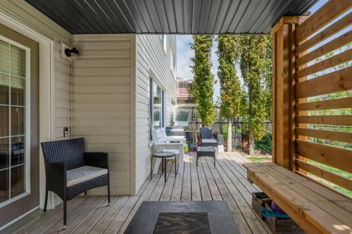 105 Sunset Common, Cochrane, AB - Outdoor With Deck Patio Veranda With Exterior