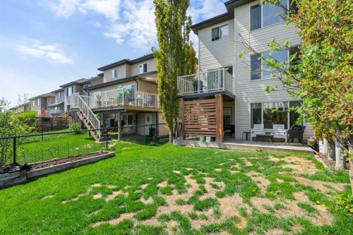 105 Sunset Common, Cochrane, AB - Outdoor With Deck Patio Veranda