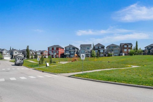 105 Sunset Common, Cochrane, AB - Outdoor With Facade