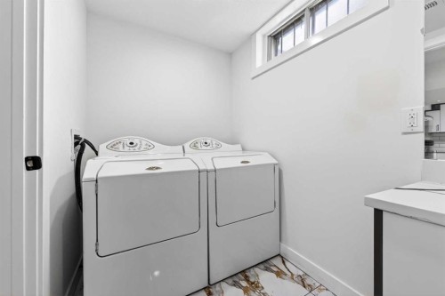 5423 Madigan Drive Ne, Calgary, AB - Indoor Photo Showing Laundry Room