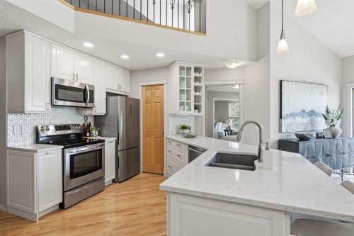 131 Springbank Terrace Sw, Calgary, AB - Indoor Photo Showing Kitchen With Stainless Steel Kitchen With Double Sink With Upgraded Kitchen