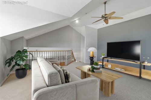 131 Springbank Terrace Sw, Calgary, AB - Indoor Photo Showing Living Room