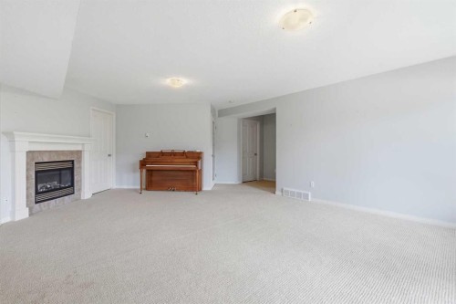 131 Springbank Terrace Sw, Calgary, AB - Indoor With Fireplace