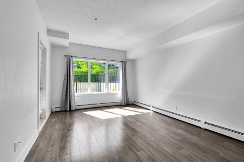 107-611 Edmonton Trail Ne, Calgary, AB - Indoor Photo Showing Other Room