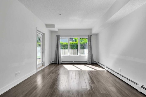 107-611 Edmonton Trail Ne, Calgary, AB - Indoor Photo Showing Other Room