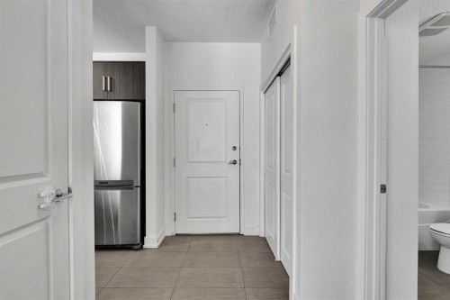 107-611 Edmonton Trail Ne, Calgary, AB - Indoor Photo Showing Other Room