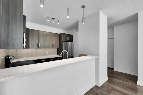 107-611 Edmonton Trail Ne, Calgary, AB - Indoor Photo Showing Other Room