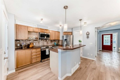142 Auburn Bay Heights Se, Calgary, AB - Indoor Photo Showing Kitchen With Stainless Steel Kitchen With Upgraded Kitchen