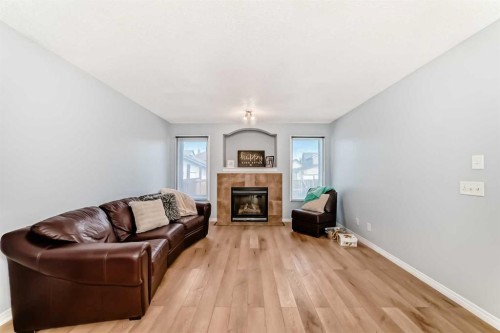 142 Auburn Bay Heights Se, Calgary, AB - Indoor Photo Showing Living Room With Fireplace