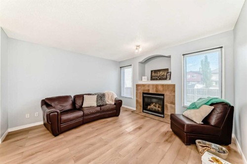 142 Auburn Bay Heights Se, Calgary, AB - Indoor Photo Showing Living Room With Fireplace