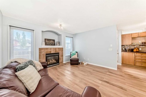 142 Auburn Bay Heights Se, Calgary, AB - Indoor Photo Showing Living Room With Fireplace