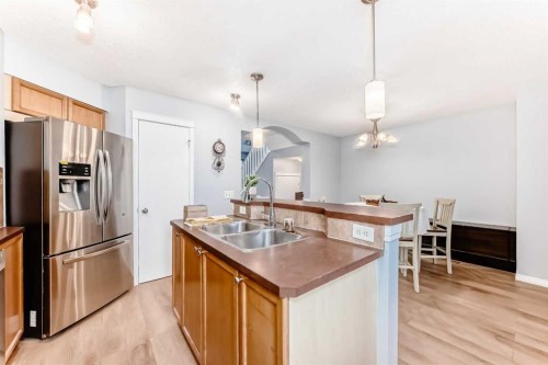 142 Auburn Bay Heights Se, Calgary, AB - Indoor Photo Showing Kitchen With Stainless Steel Kitchen With Double Sink