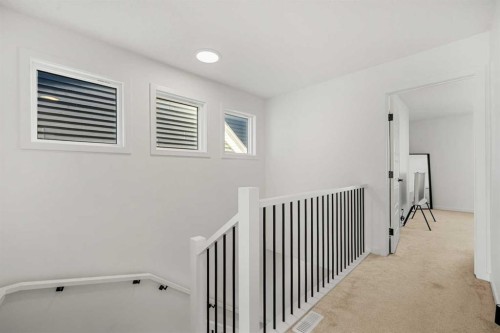 218 Aquila Way Nw, Calgary, AB - Indoor Photo Showing Other Room