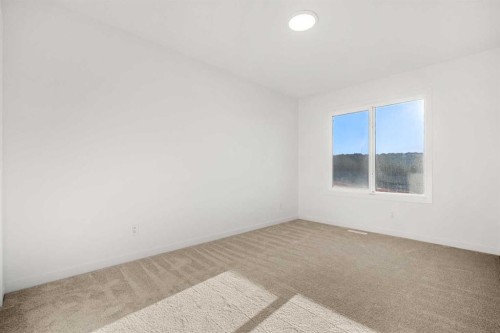 218 Aquila Way Nw, Calgary, AB - Indoor Photo Showing Other Room