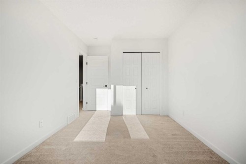 218 Aquila Way Nw, Calgary, AB - Indoor Photo Showing Other Room