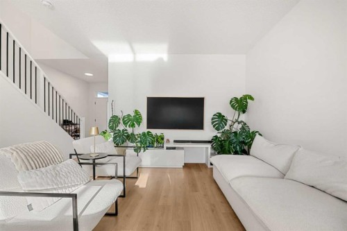 218 Aquila Way Nw, Calgary, AB - Indoor Photo Showing Living Room