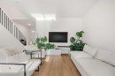 218 Aquila Way Nw, Calgary, AB  - Indoor Photo Showing Living Room 
