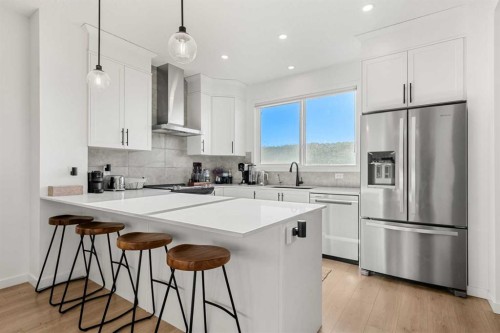 218 Aquila Way Nw, Calgary, AB - Indoor Photo Showing Kitchen With Upgraded Kitchen