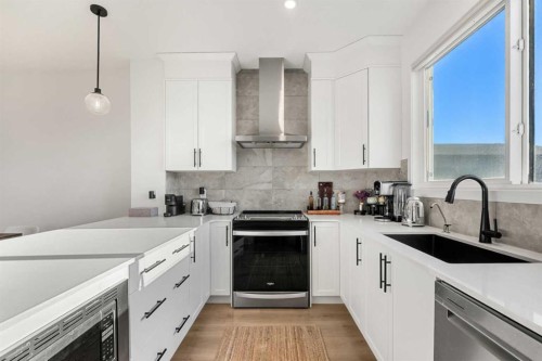 218 Aquila Way Nw, Calgary, AB - Indoor Photo Showing Kitchen With Upgraded Kitchen