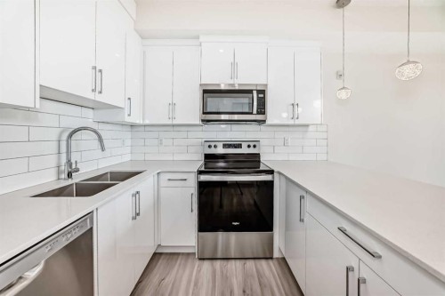 2406-15 Skyview Point Crescent, Calgary, AB - Indoor Photo Showing Kitchen With Stainless Steel Kitchen With Double Sink With Upgraded Kitchen
