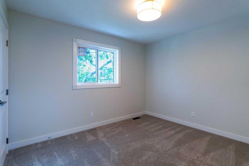 61 Cimarron Way, Okotoks, AB - Indoor Photo Showing Other Room