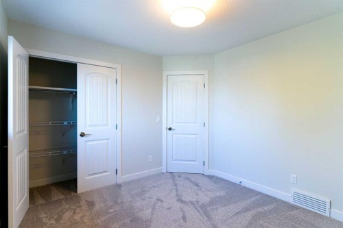 61 Cimarron Way, Okotoks, AB - Indoor Photo Showing Other Room