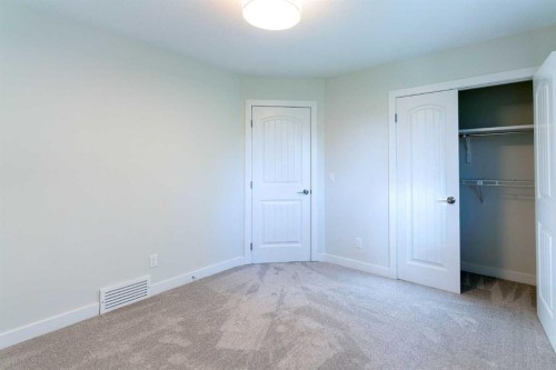 61 Cimarron Way, Okotoks, AB - Indoor Photo Showing Other Room