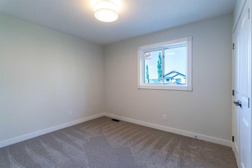 61 Cimarron Way, Okotoks, AB - Indoor Photo Showing Other Room