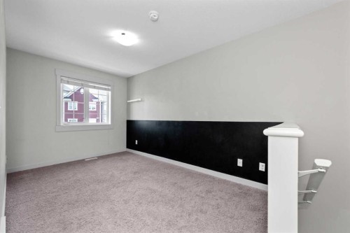 140 Cascades Pass, Chestermere, AB - Indoor Photo Showing Other Room