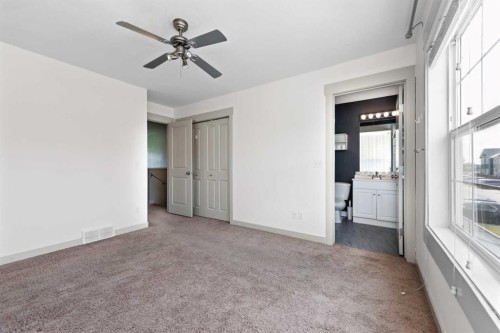 140 Cascades Pass, Chestermere, AB - Indoor Photo Showing Other Room