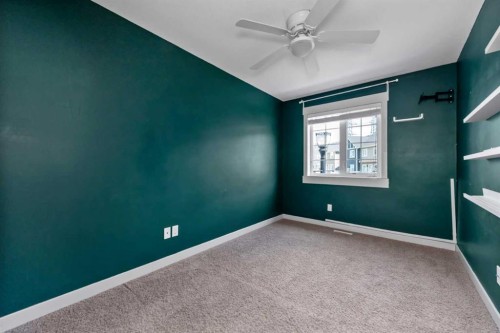 140 Cascades Pass, Chestermere, AB - Indoor Photo Showing Other Room