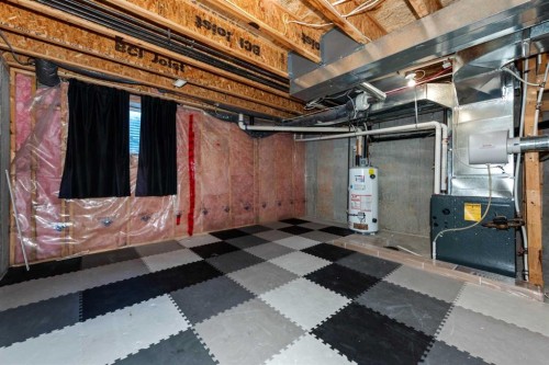 140 Cascades Pass, Chestermere, AB - Indoor Photo Showing Basement
