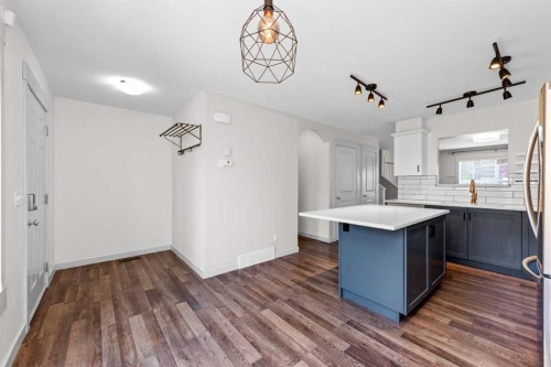 140 Cascades Pass, Chestermere, AB - Indoor Photo Showing Kitchen With Upgraded Kitchen