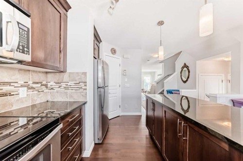 50 Elgin Meadows Park Se, Calgary, AB - Indoor Photo Showing Kitchen With Upgraded Kitchen
