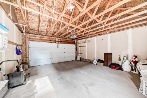 50 Elgin Meadows Park Se, Calgary, AB - Indoor Photo Showing Garage