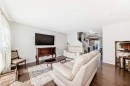 50 Elgin Meadows Park Se, Calgary, AB  - Indoor Photo Showing Living Room 