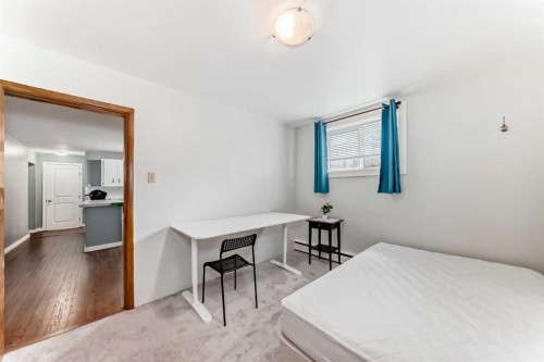 6441 18A Street Se, Calgary, AB - Indoor Photo Showing Bedroom