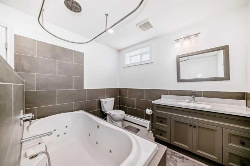 6441 18A Street Se, Calgary, AB - Indoor Photo Showing Bathroom