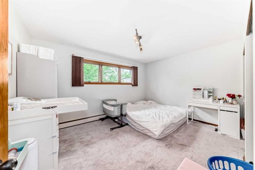 6441 18A Street Se, Calgary, AB - Indoor Photo Showing Bedroom